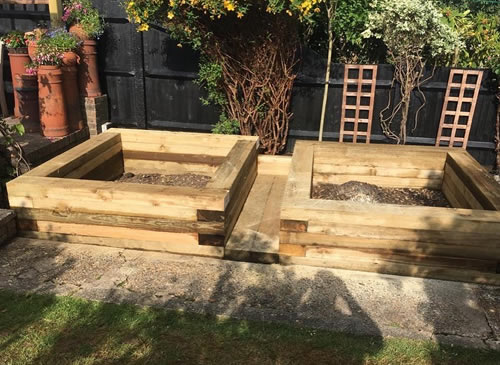 bespoke raised wooden planters built by Maple Carpentry